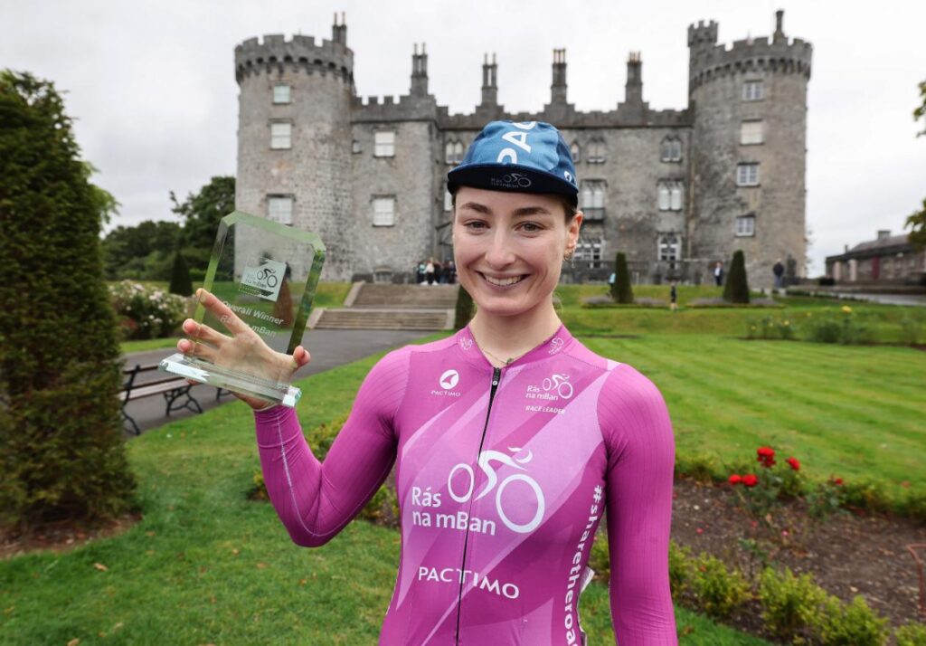 Kilkenny native Mia Griffin in front of Kilkenny Castle as winner of the 2024 Rás na mBan